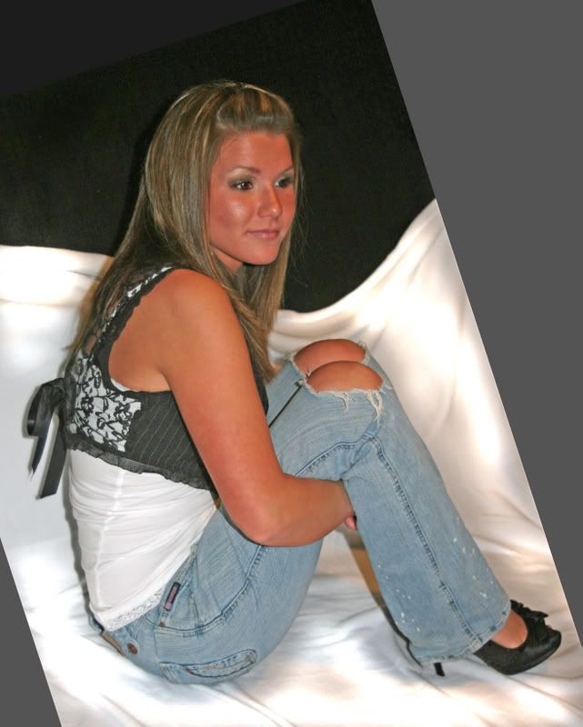 IMAGE: http://i145.photobucket.com/albums/r213/joanfstel/KKsittingkneesup.jpg