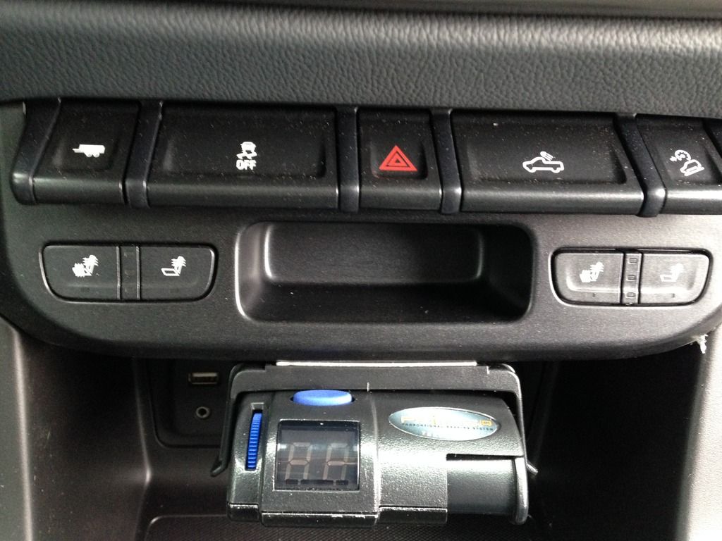 ... allows the wiring harness to make it out the back of the box and find its way to connect with the wires located behind the drivers side left kick panel.